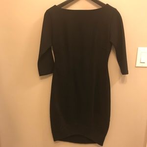 Black dress with 3/4 sleeves.